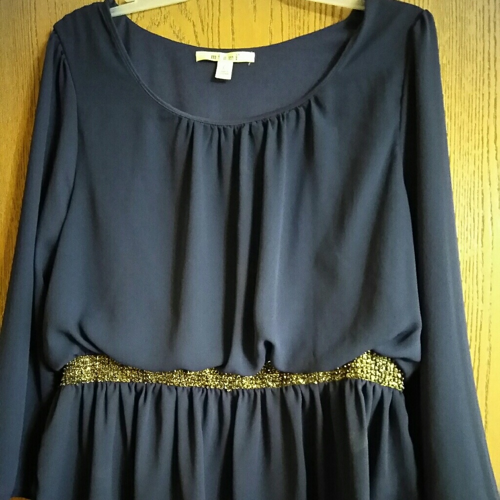 Navy peplum with sparkly detail