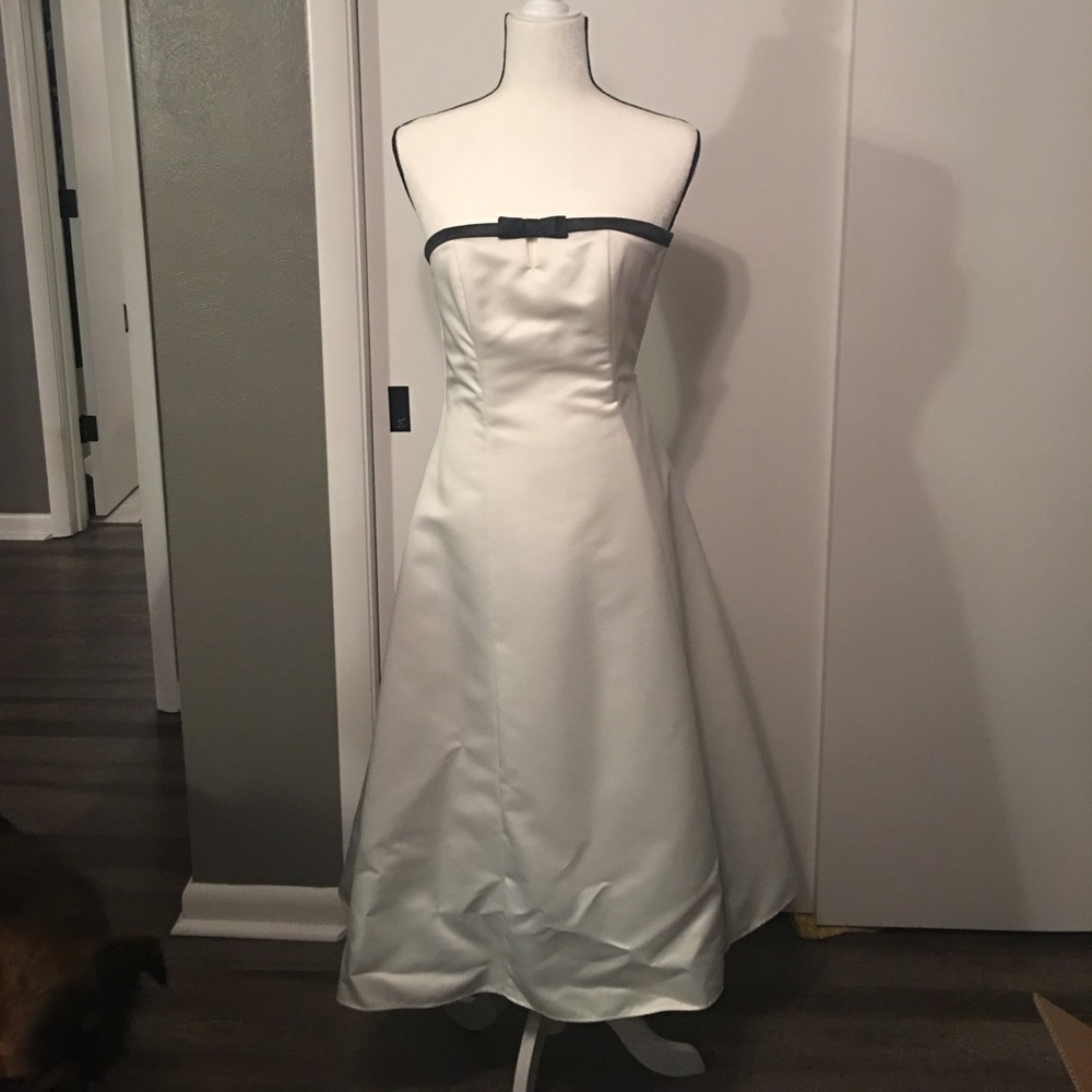 Classic white strapless tea length dress