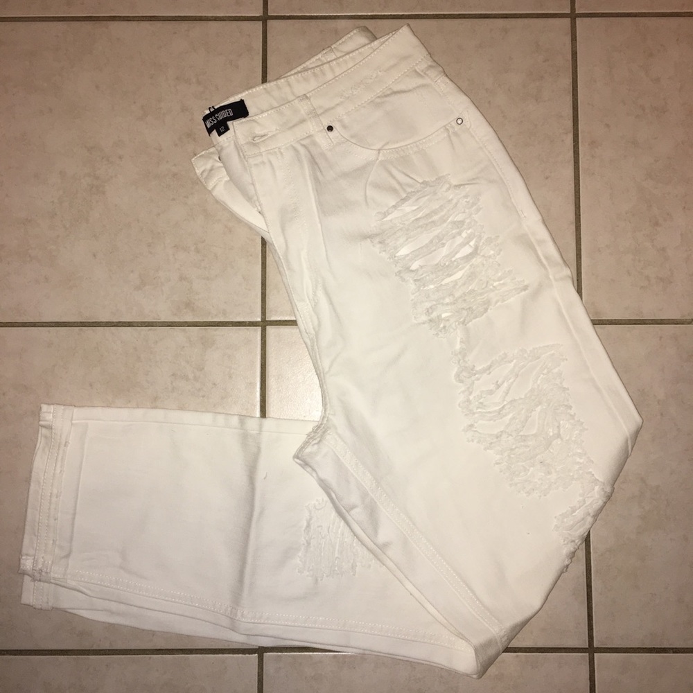 Distressed white boyfriend jeans