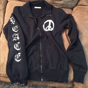 Black “peace” zip-up