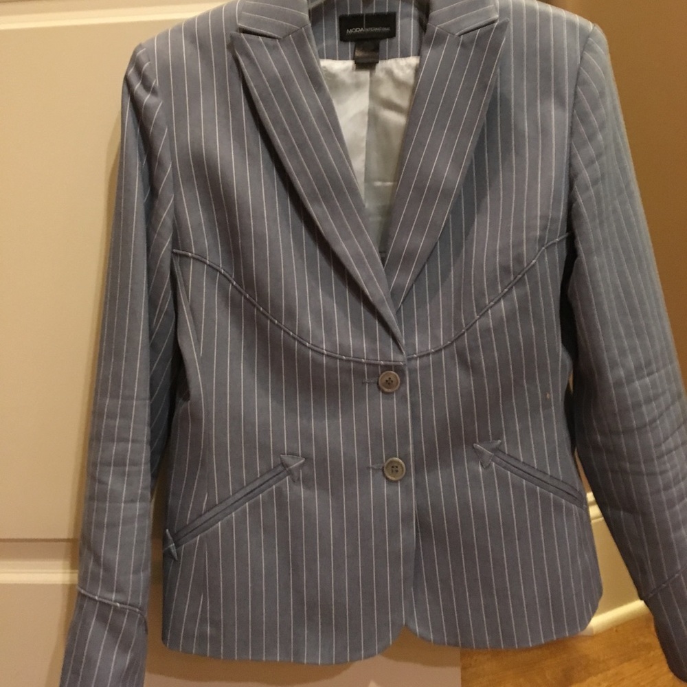 Blue/grey blazer with white stripes. Worn twice.