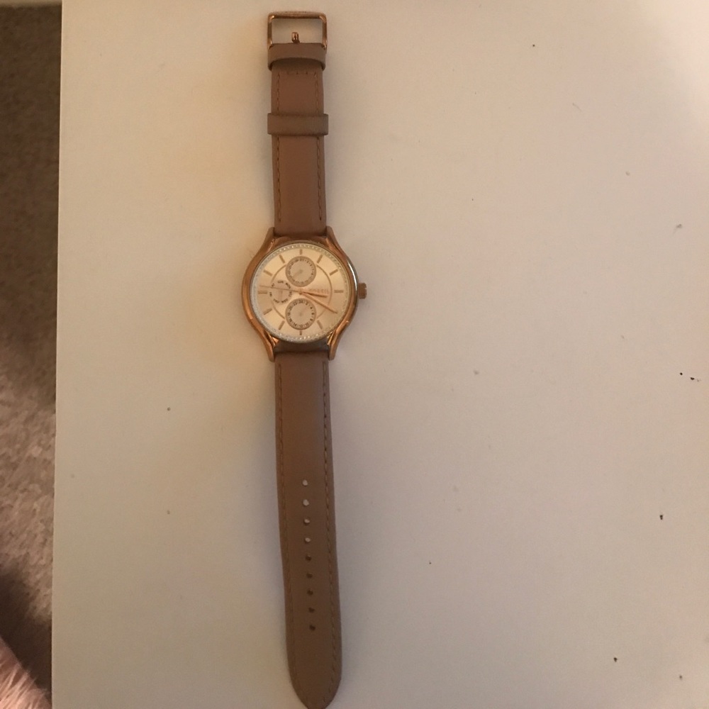 Gold fossil watch