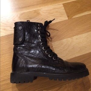 Black stylish combat boots