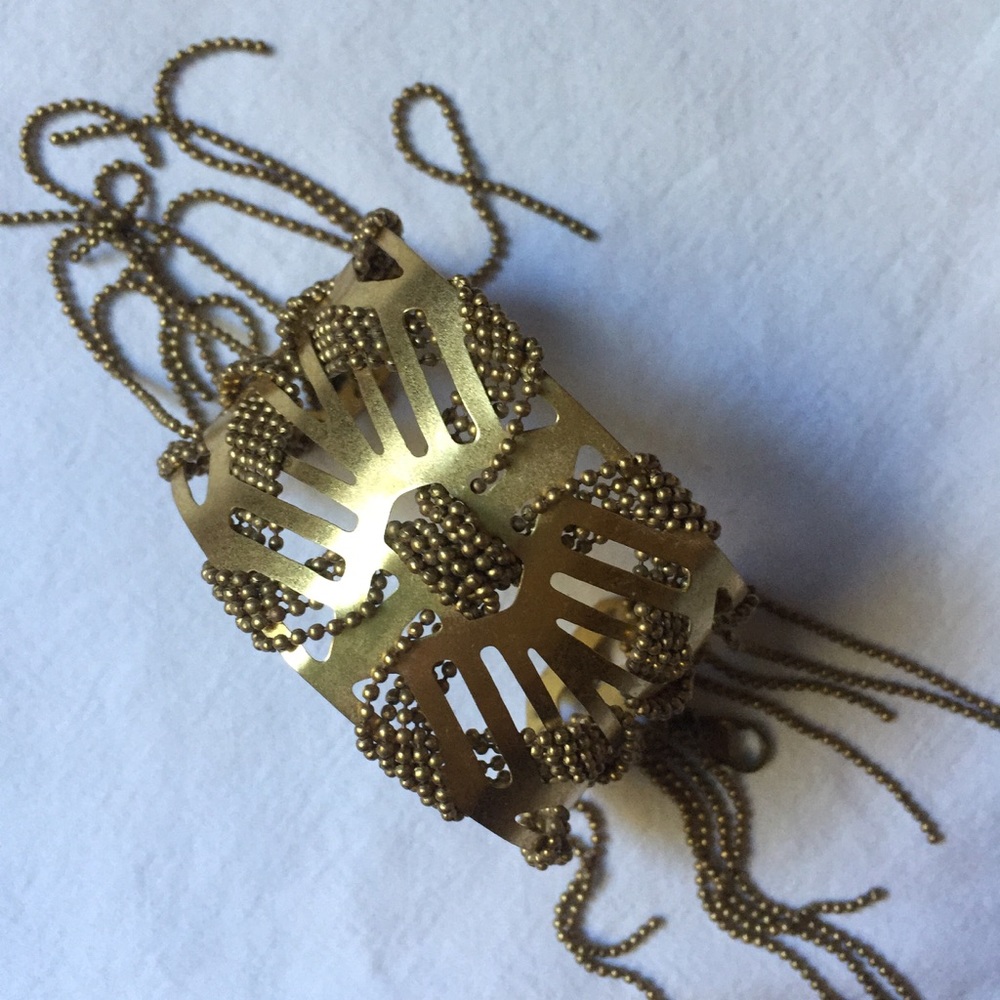 Noonday gold dangly bangle