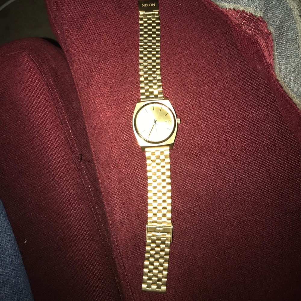 Gold nixion watch