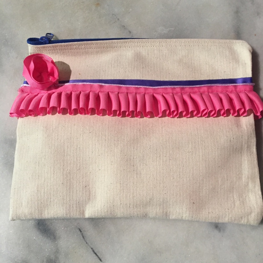 Pink frilly trim and purple ribbon canvas clutch!