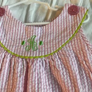 Sweet little girl pinafore embroidered with "A"