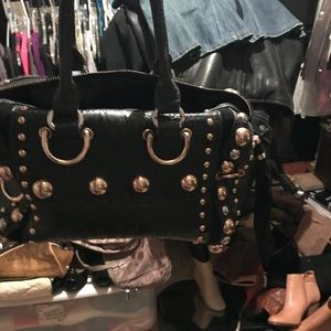 Black handbag with gold studs