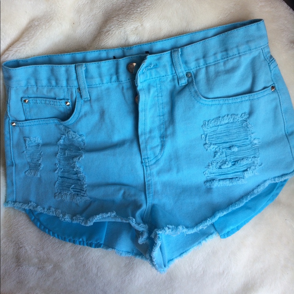 Forever 21 turquoise distressed denim shorts