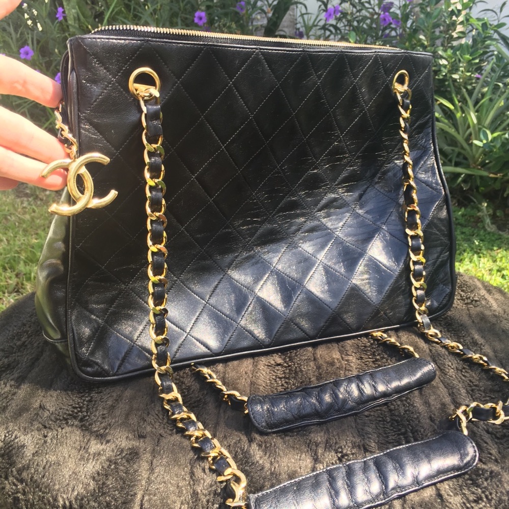 Authentic Vintage Chanel CC lambs skin bag.