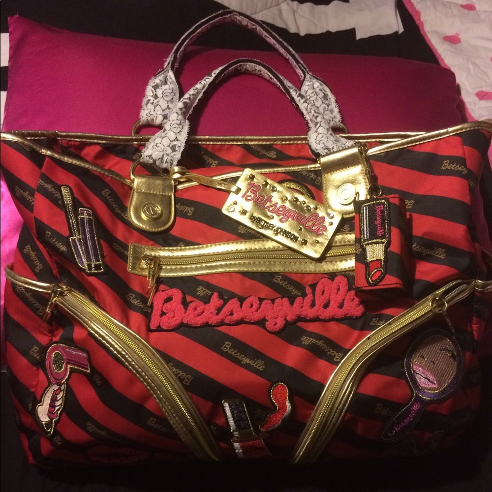 Betsey Johnson striped weekender bag