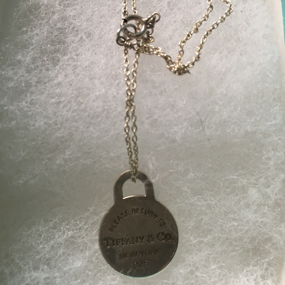 Tiffany and co. Sterling silver charm necklace.