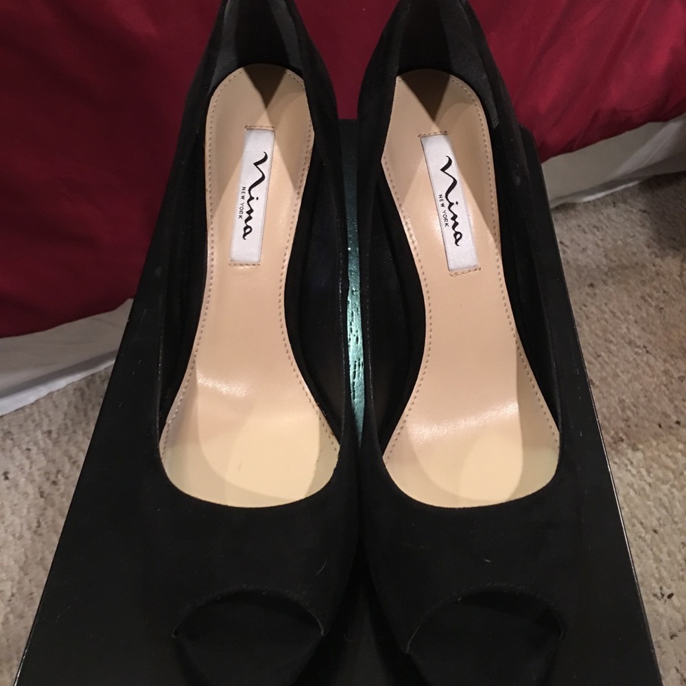 Black Peep Toe Pump with sparkle heel.