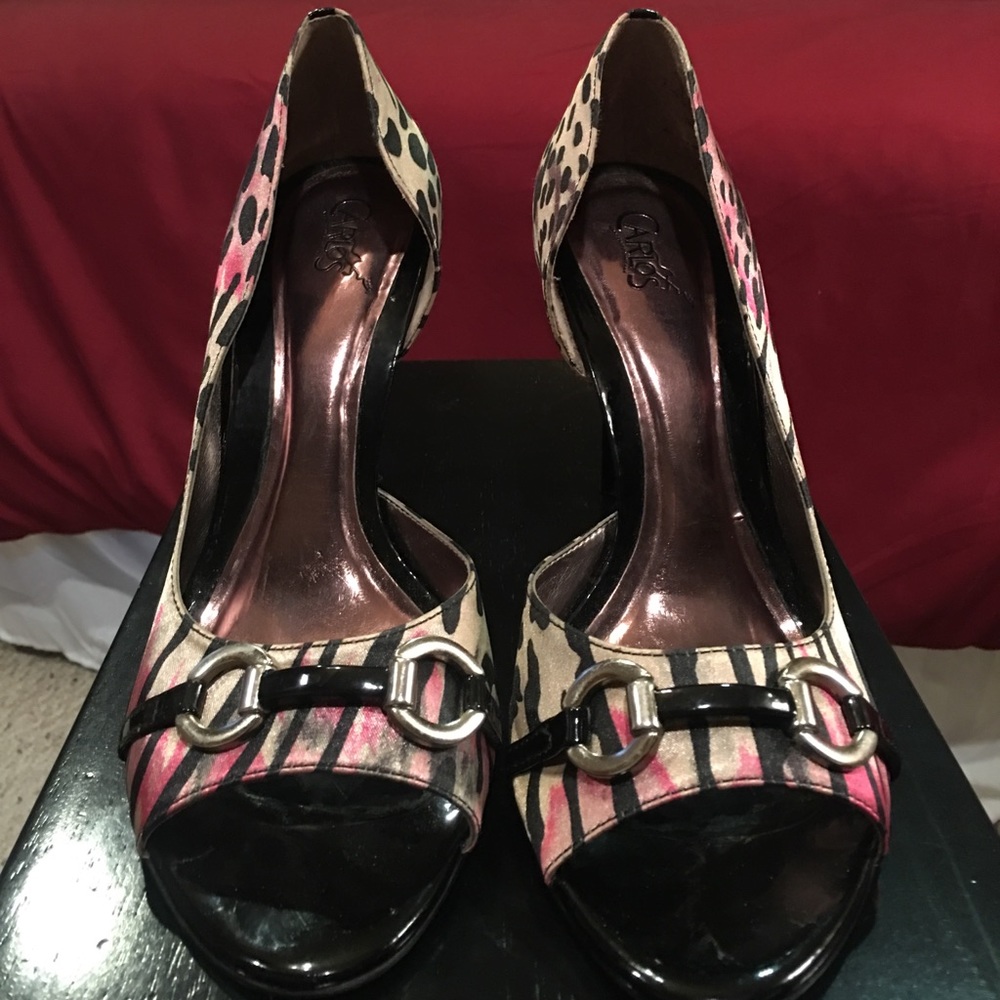 Animal print peep toe pumps by Carlos Santana.