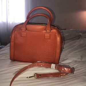 Orange snakeskin purse