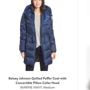 Mid length puffy jacket