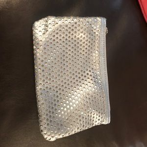 small light blue accessory bag