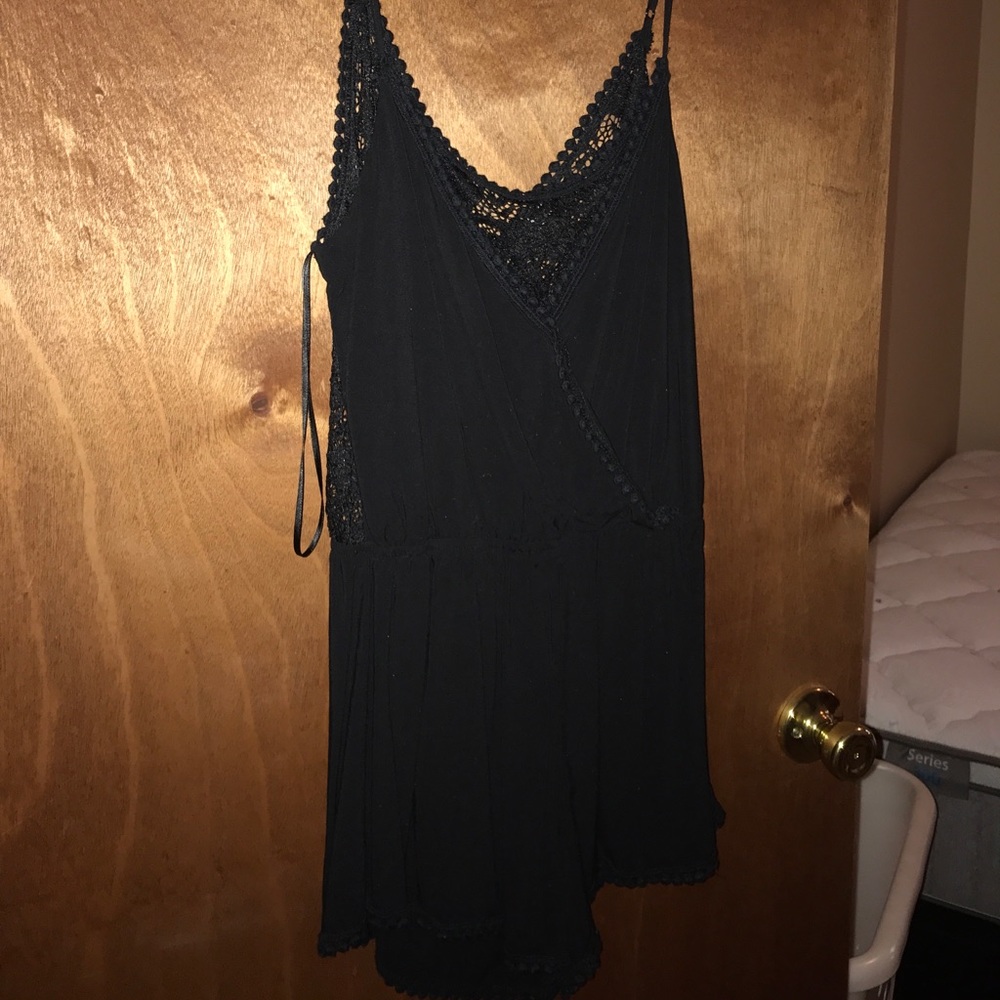 🔴SOLD🔴 Black Romper with lace top and back.