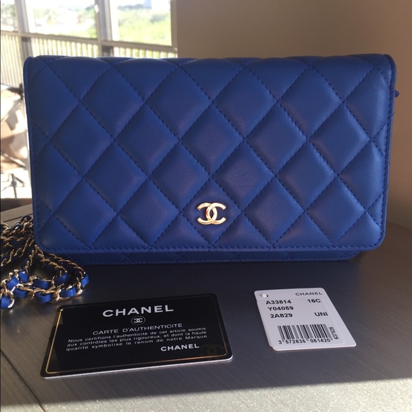 CHANEL Handbags - CHANEL BLUE LAMB Wallet On a CHAIN