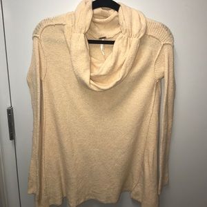 Free people off the shoulder/turtleneck sweater.
