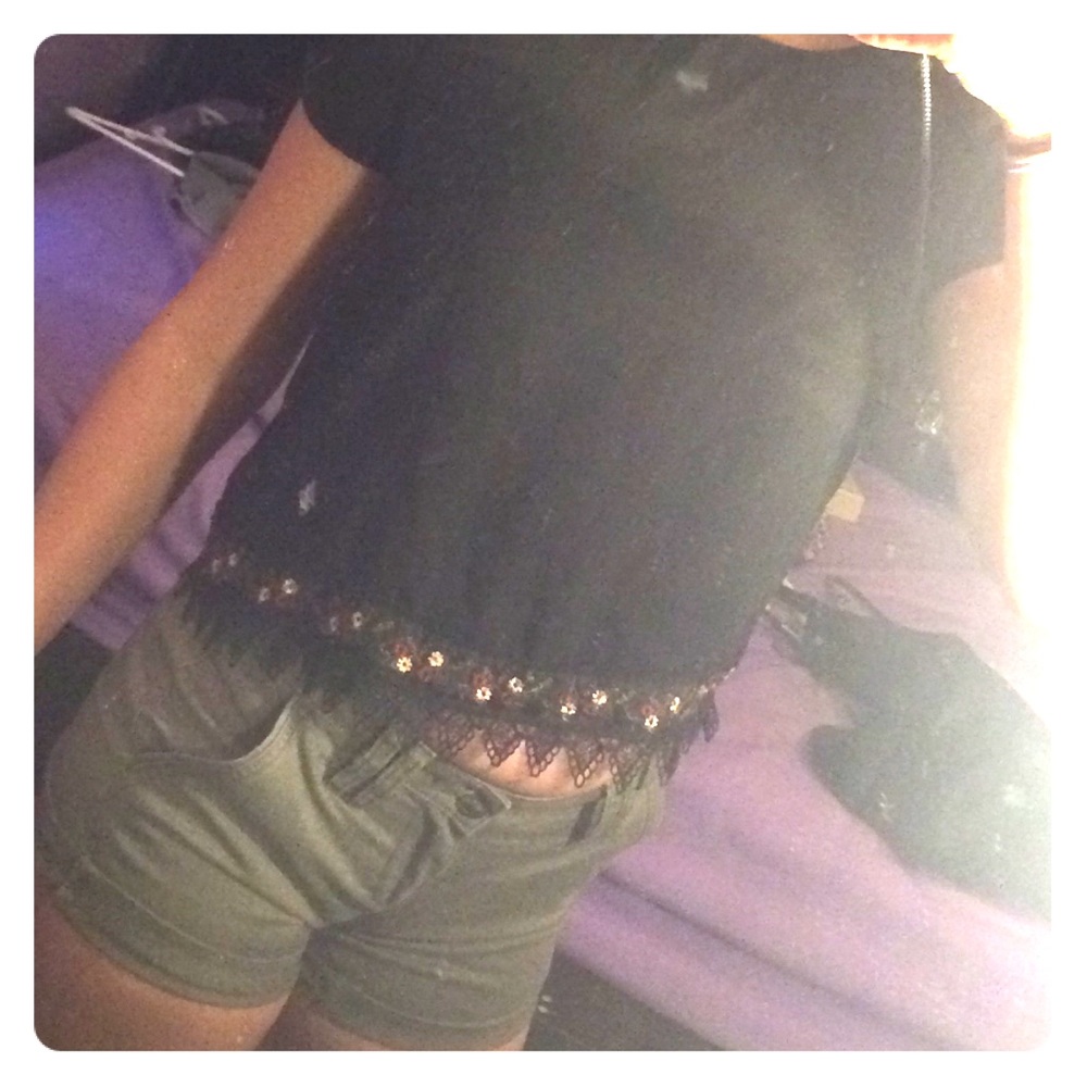 Cute, black shirt with floral print at the bottom
