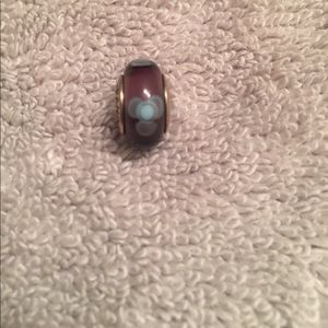 Blue flower with purple background Pandora charm