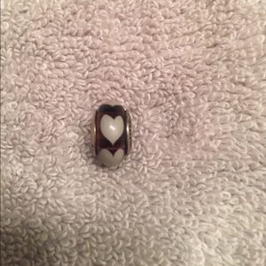 White heart on a dark purple Pandora charm