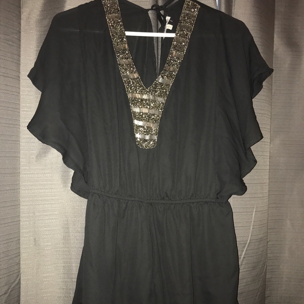 Black romper with embellishments