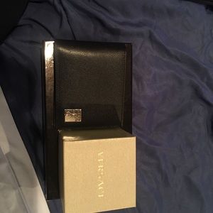 Versace wallet.