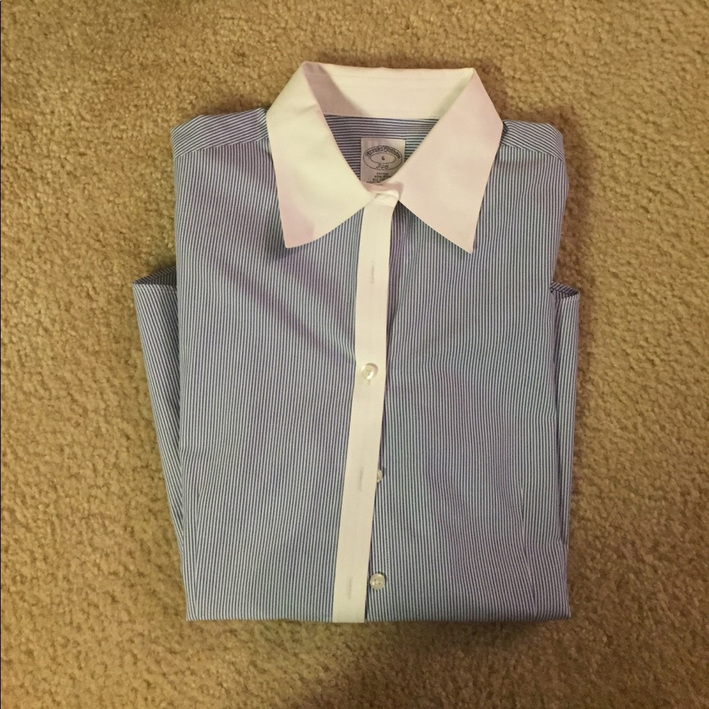 Blue and white button down shirt.