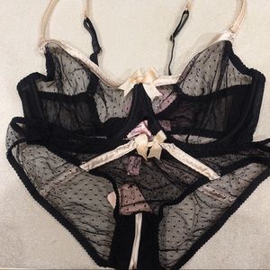 Black panties with crotchless slit.