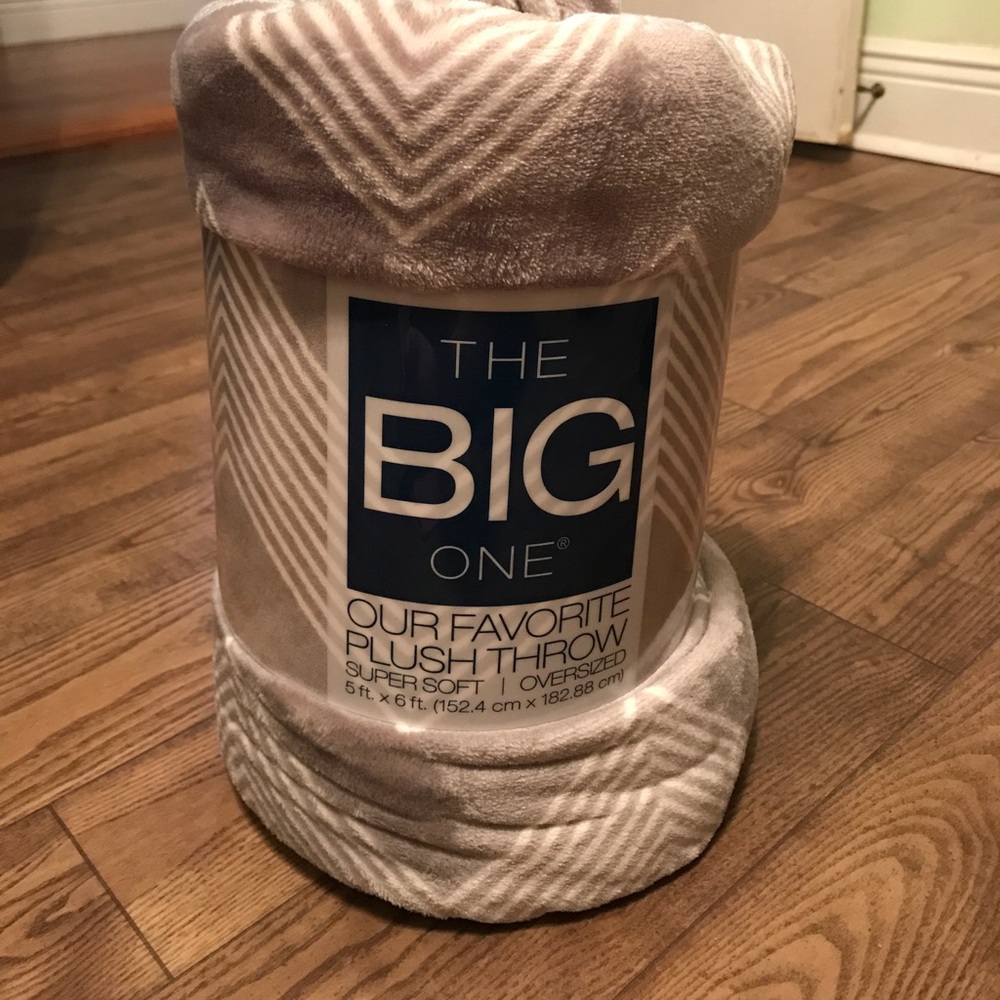 Grey and white plush throw