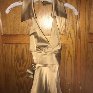 Gold dressy Halter Top with belt and peplum.