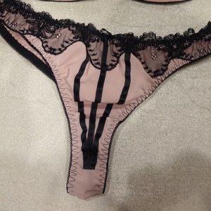 Black and pink thong. Never worn.
