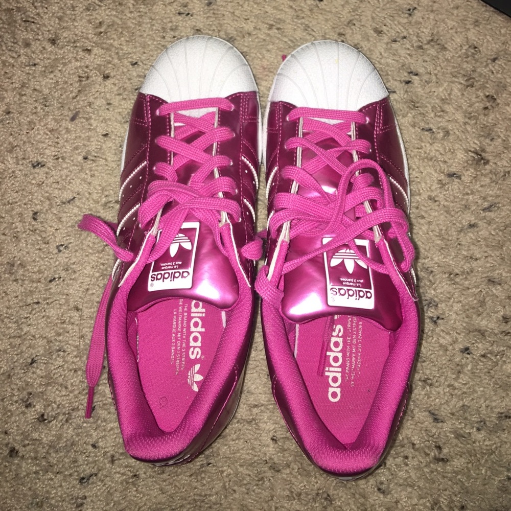Pink and white adidas