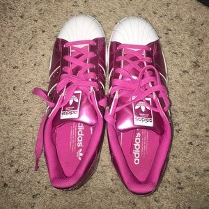 Pink and white adidas