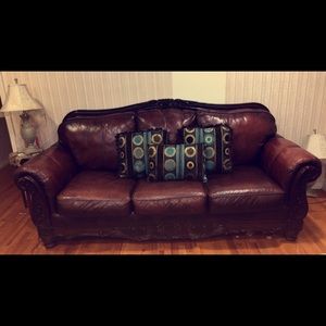 Couches with two chairs and two curtains