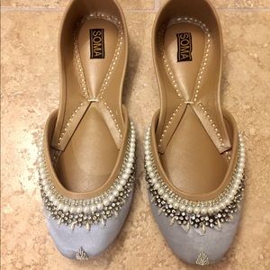 Handmade, leather embellished ballet flats.