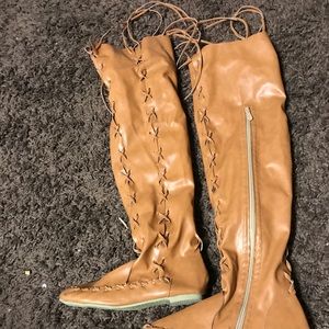 Over the knee moccasins