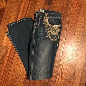 Cache embroided jeans.