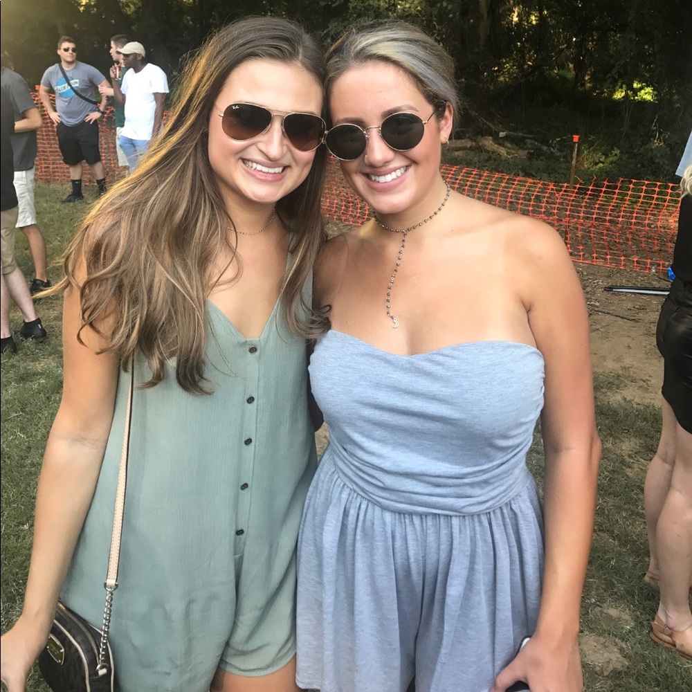 Grey Romper on the RIGHT