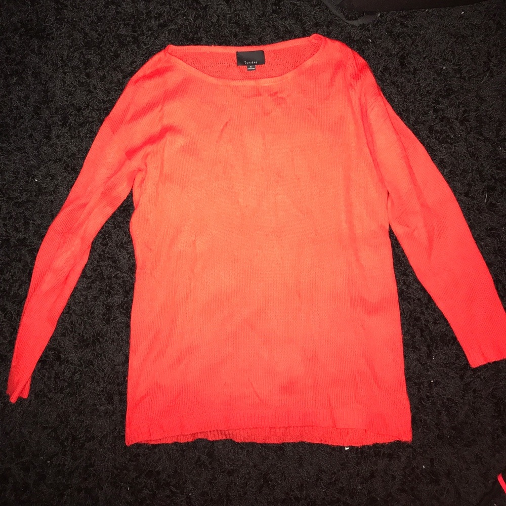 orange/ red sweater