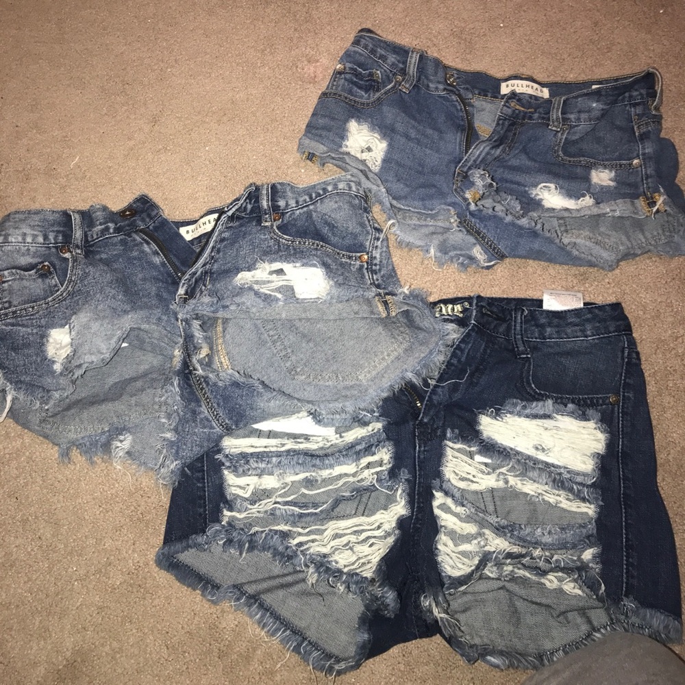 THREE pairs of jean shorts