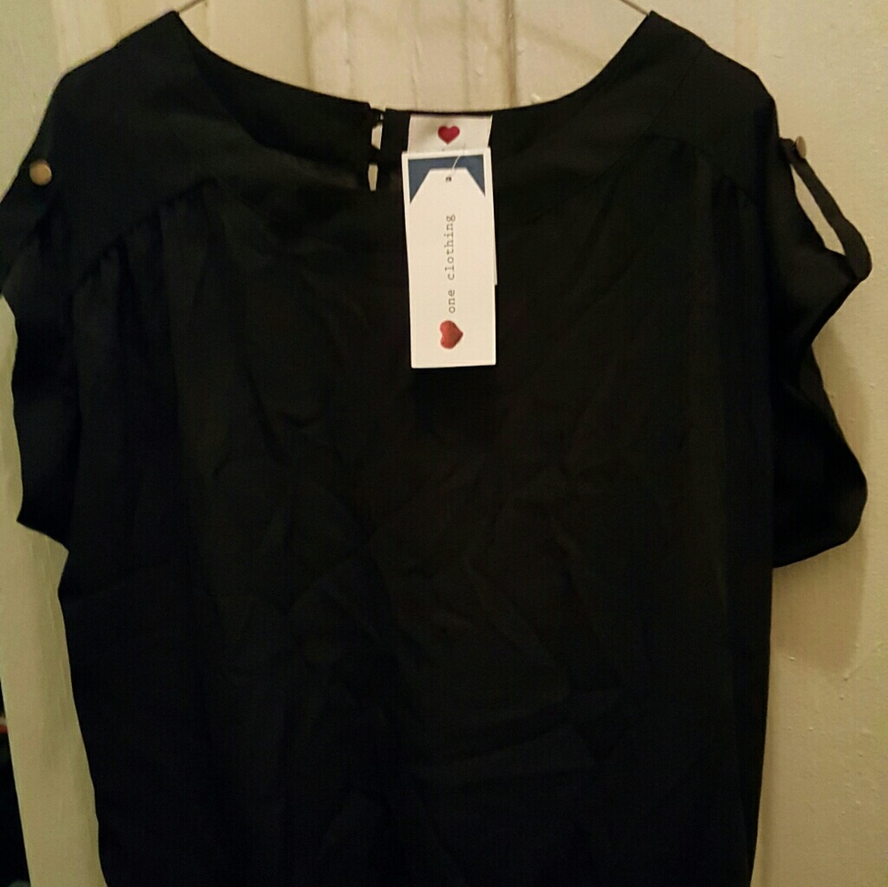 Black shirt with epaulets and gold button