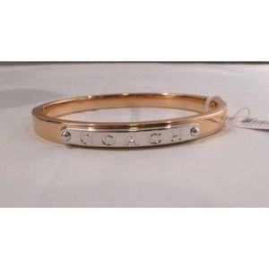Gold & Silver COACH bangle