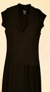 Slim and sexy fitting blk dress.