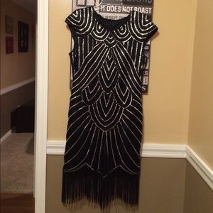 Black and silver sequined party dress