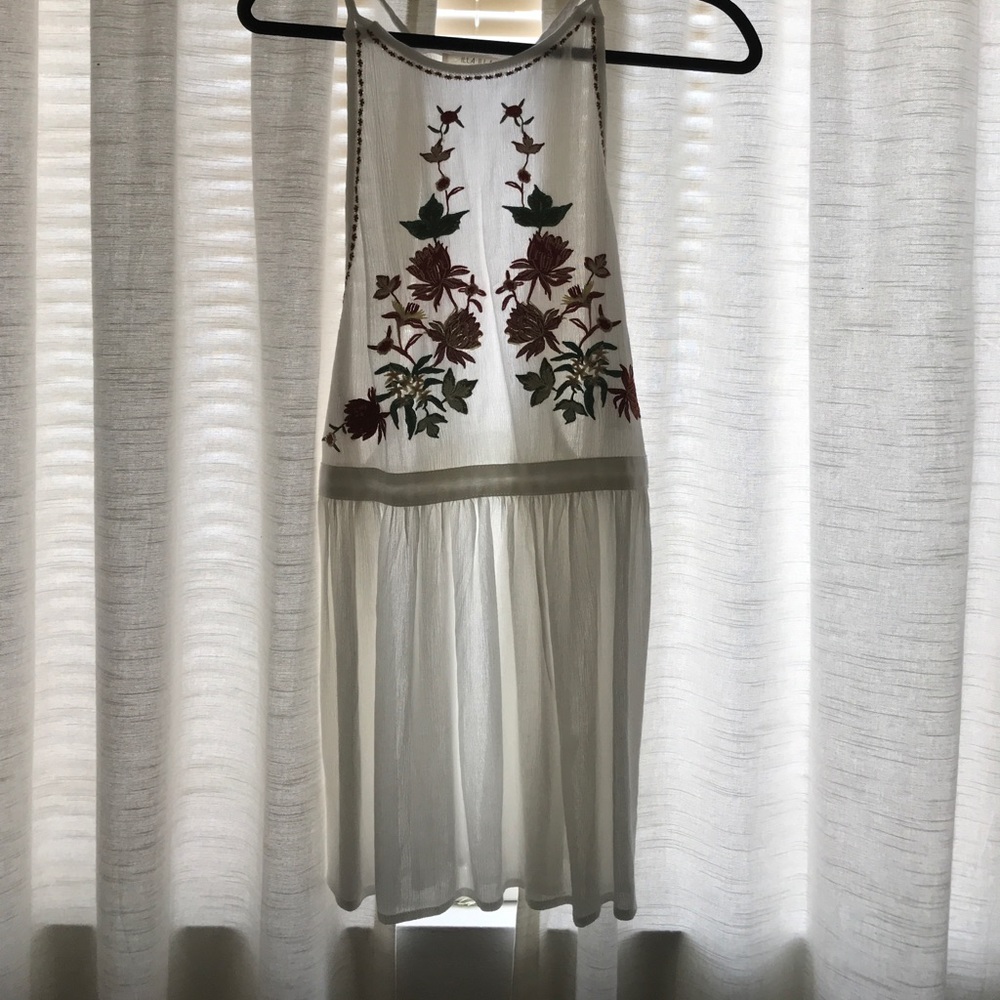 White flower embroidered- Size small tunic.