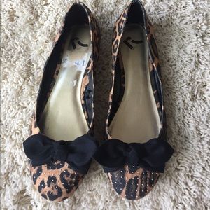 Cheetah print flats with sequins.