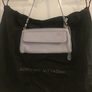 Genuine leather Designer wallet style handbag.